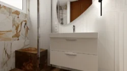 Biała płytka boazeryjna w łazience na ścianie
