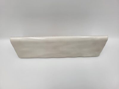 Biała listwa wykończeniowa do płytek - Peronda Harmony TRIM.RIAD WHITE 6,5×20 cm. Płytka wykończeniowa z zaokrągloną górna krawędzią.