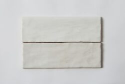 Liistwy ceramiczne wykończeniowe - Harmony TRIM.RIAD WHITE 6,5×20cm. Biała listwa w połysku z zaokrąglonym górnym bokiem.