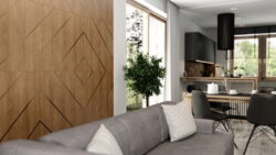 Panele ścienne drewniane w salonie. Dekory drewniane na ścianę z satynowanymi listwami z mosiądzu, które pod wpływem światła zmieniają barwę.