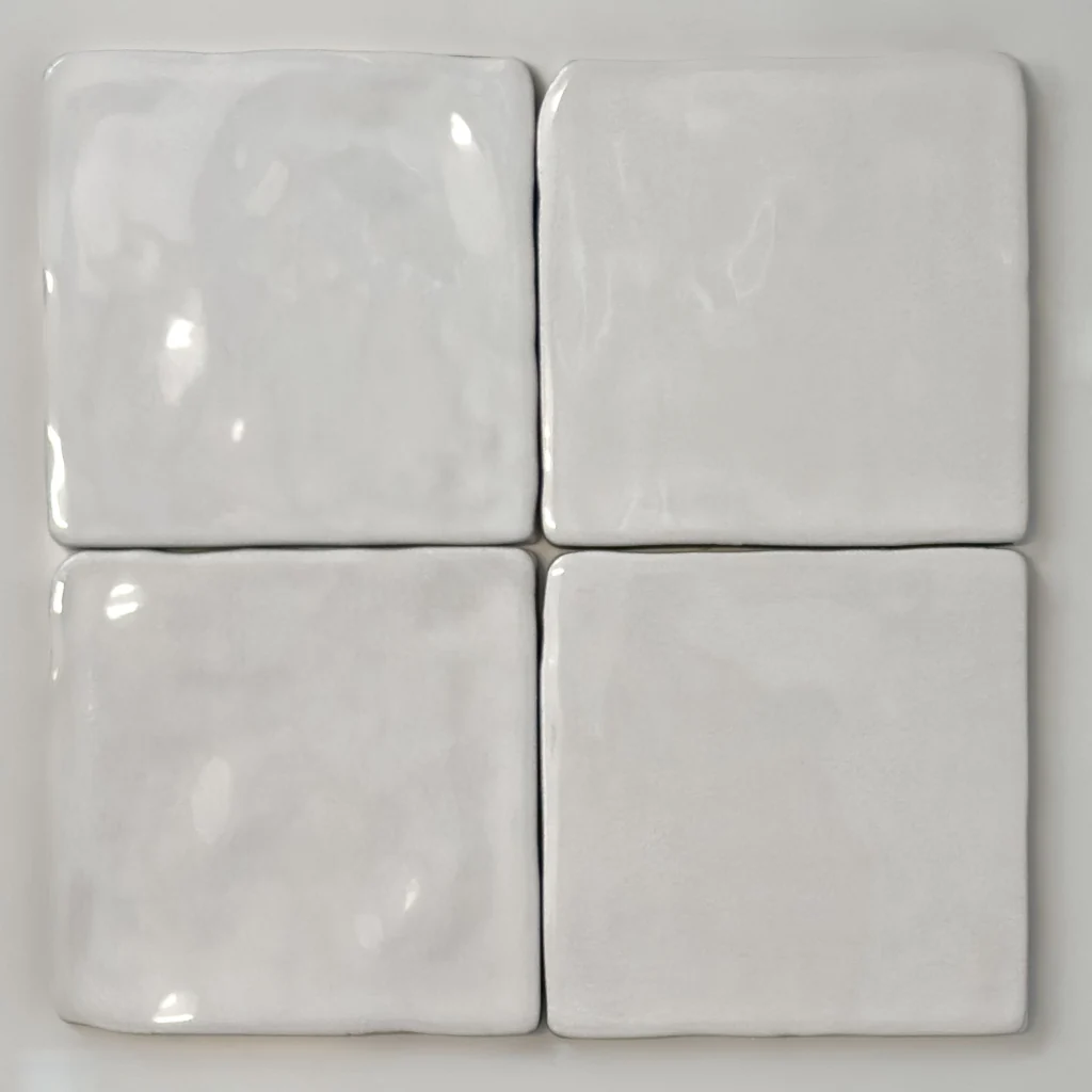 Białe płytki kwadratowe, rustykalne, ścienne - Harmony HANA WHITE 12x12. Kafelki z mocno nieregularnymi krawędziami. Widok na 4 płytki.