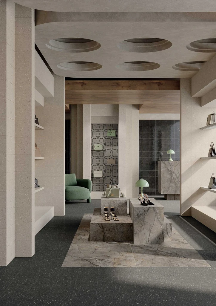 Płytki ciemnoszare 20x20cm, błyszczące, kamieniopodobne na ścianie w sklepie - Marca Corona Terrasale NERO LACCA 20x20 K255