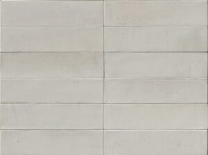Białe płytki do łazienki - Marazzi Crogiolo Lume Off White MA9P. Włoskie płytki z błyszczącą powierzchnią na ścianę lub podłogę.