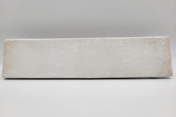 Glazura cegiełka biała - Peronda Harmony SUNSET WHITE 6x25 cm. Hiszpańskie cegiełki ceramiczne na ścianę z matową i błyszczącą powierzchnią oraz ciemnymi rantami.