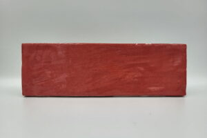 Czerwone płytki łazienkowe - Harmony RIAD RED 6,5×20. Śliczne płytki w małym formacie cegiełki z rzemieślniczym wyglądem w połysku.