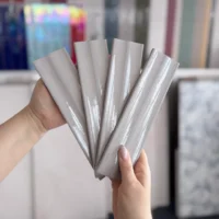 Marca Corona Miniature Rima Piuma 6X24 płytki 3d ścienne szare błyszczące