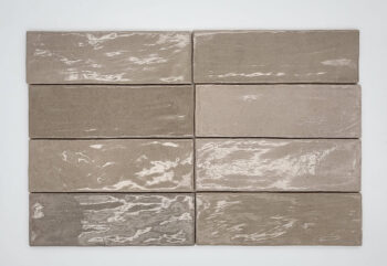 Płytki błyszczące do kuchni - Harmony RIAD TAUPE 6,5x20 cm. Kafelki ceramiczne z połyskującą powierzchnią na ścianę w odcieniach szarości i brązu.