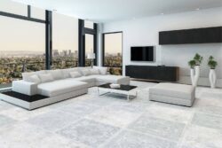 Gres imitacja kamienia - Absolut Keramika Java pearl 80x80 cm. Jasny salon z płytkami gresowymi, imitującymi kamień na podłodze i ścianie.