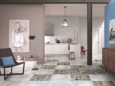 Płytki imitacja betonu 60x60 - Absolut Keramika Corfu G . Salon z płytkami podłogowymi Absolut Corfu G i dekorami Absolut Santorini