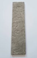 Gres ala kamień - Natucer Zion Moss 6,2x25 cm. Płytka z nierówną, matową, pokryta reliefami powierzchnią w kolorze szarym.