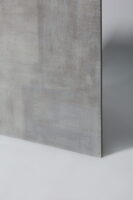 Gres imitacja betonu - Absolut Keramika Corfu G 60x60 cm. Szara płytka gresowa na podłogę i ścianę z widocznymi śladami przetarcia