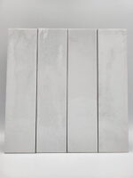 Białe kafelki do kuchni - Harmony BARI WHITE 6x24,6 cm. Cegiełki ceramiczne w odcieniach bieli z widocznymi ciemnymi przetarciami.