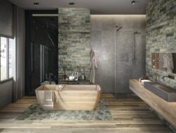 Ciemno szare płytki łazienkowe - APE Work b coal. Łazienka z płytkami imitującymi szary beton na ścianie.