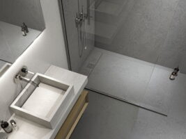 Gres do łazienki - CIFRE Norwich Anthracite N-Plus Rect. R10. Łazienka z płytkami gresowymi imitującymi beton w odcieniach szarości.