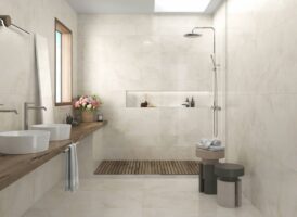 Kremowe płytki do łazienki - Absolut Axel Cream lappato 60x120 cm. Łazienka z flizami marmuropodobnymi na podłodze i ścianie.