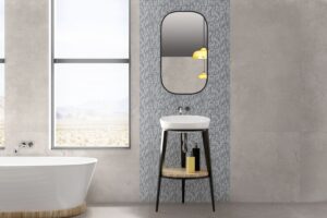 Płytki do łazienki imitacja betonu - Absolut Keramika Nusa Pearl 80×80. Łazienka z płytkami imitującymi beton na ścianie i podłodze.