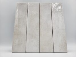 Płytki łzienkowe - Peronda Harmony Bari Sand 6×24,6 cm. Kafelki w różnych odcieniach jasnego beżu z powierzchnią w połysku i małym formacie cegiełki. Płytki do stosowania na ścianie.