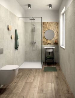 Złote płytki do łazienki - Marca Corona Miniature FUOCO ORO BRUNITO 6x24cm. Włoskie kafelki imitujące stare złoto, mosiądz na ścianie za lustrem w łazience.