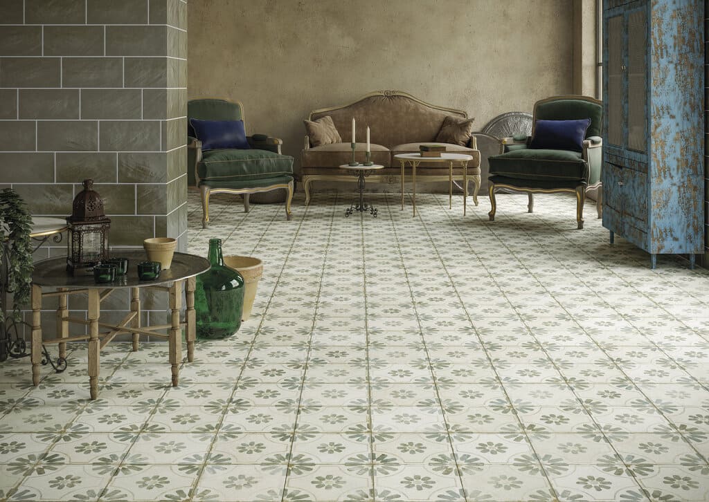 Płytki Peronda FS Blume Sage na podłodze salonu w stylu vintage z zielonymi fotelami, sofą i niebieską szafą