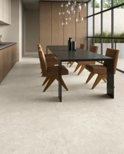 UNICOM STARKER Blooming Stone Alabaster White 120x120 mat na podłodze w jadalni.