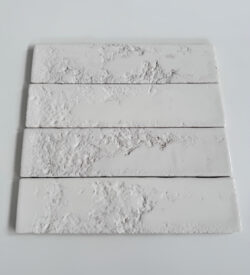 Błyszczące, białe płytki 3d - Natucer Arches White 6,2x25cm. Kafelki cegiełki na ścianę z wżerami.