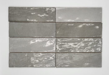 Płytki łazienkowe szare, połysk- Harmony RIAD GREY 6,5x20 cm. Płytki na ścianę wysoki połysk w odcieniach szarości z nieregularną powierzchnią.