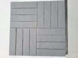 Płytki matowe cegiełki szare - Peronda Harmony RABAT GREY 6×24,6cm. Płytki z lekko pofalowaną powierzchnią w macie i kolorze szarym. Zdjęcie przedstawia ułożone płytki.