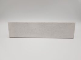 Szare kafelki cegiełki - Harmony Bari Silver 6x24,6 cm. Płytki w małym, podłużnym formacie z błyszczącą, przecieraną powierzchnią, lekko wklęsłą.
